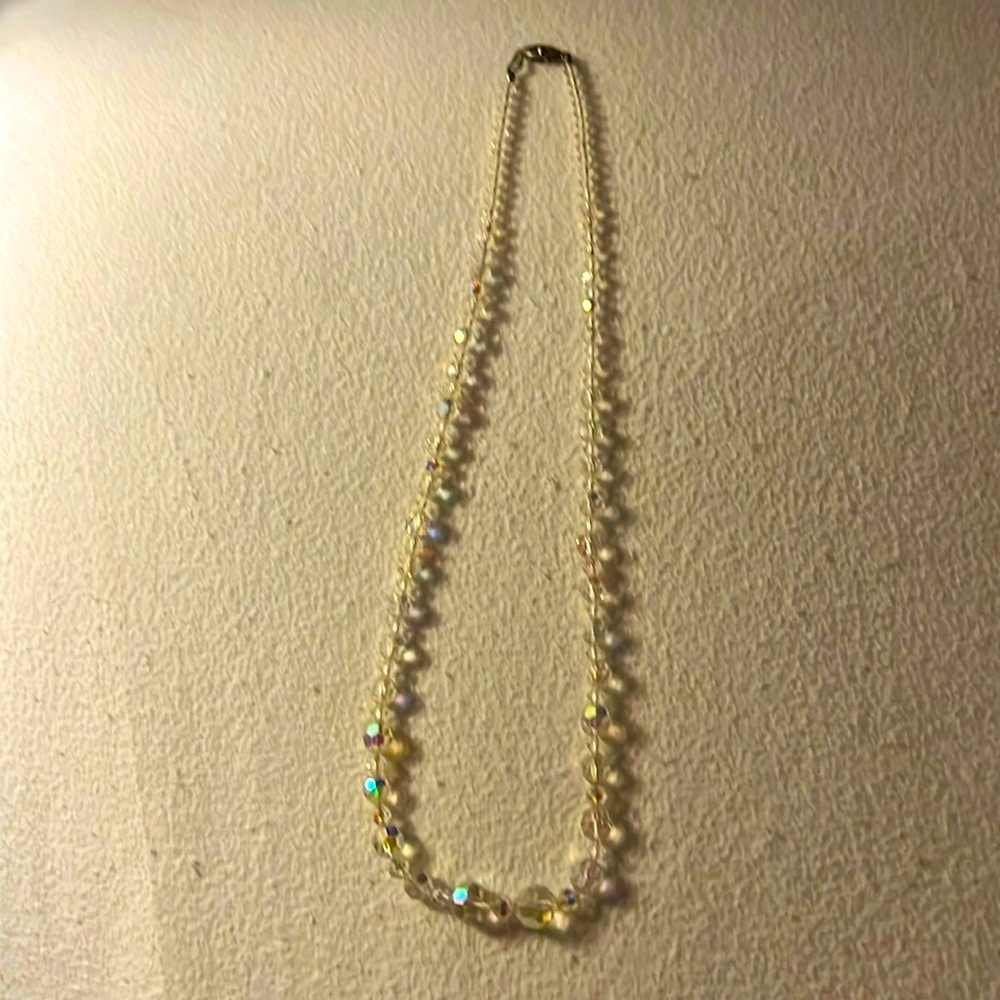 1950's Single Strand Aurora Borealis faceted glass bead necklace.  24”.